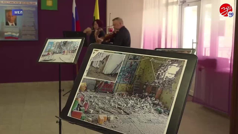 В Мелитополе открылась фотовыставка «Хроники террора украинского неонацистского режима»